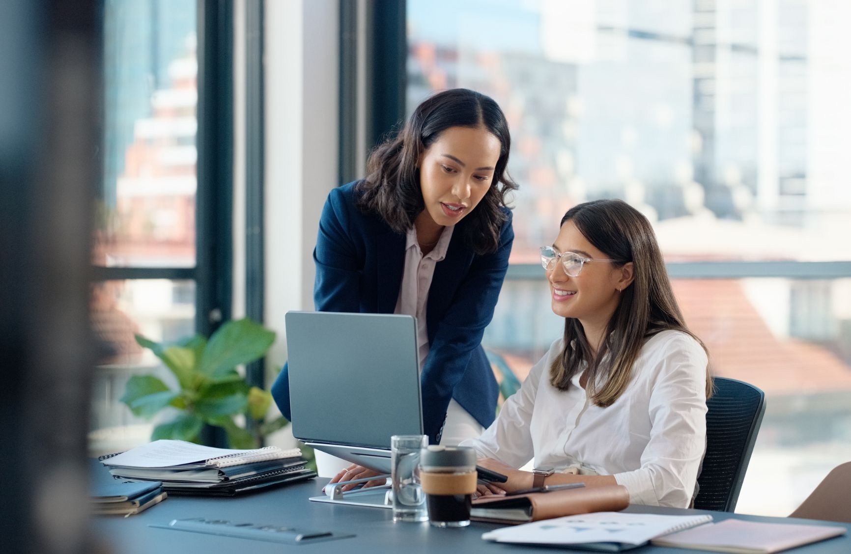 2 business women having discussion