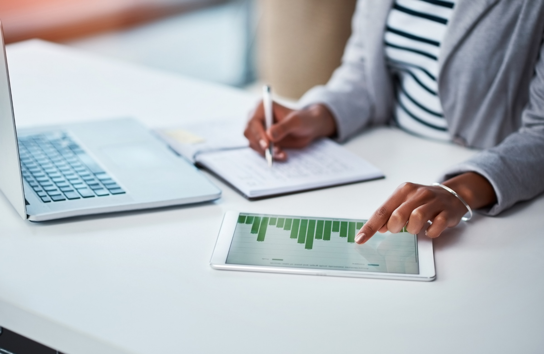 Person studying bar graph